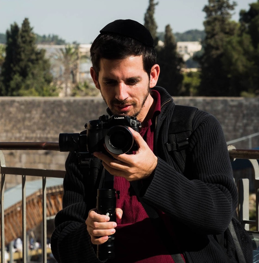 Menachem Schloss filming