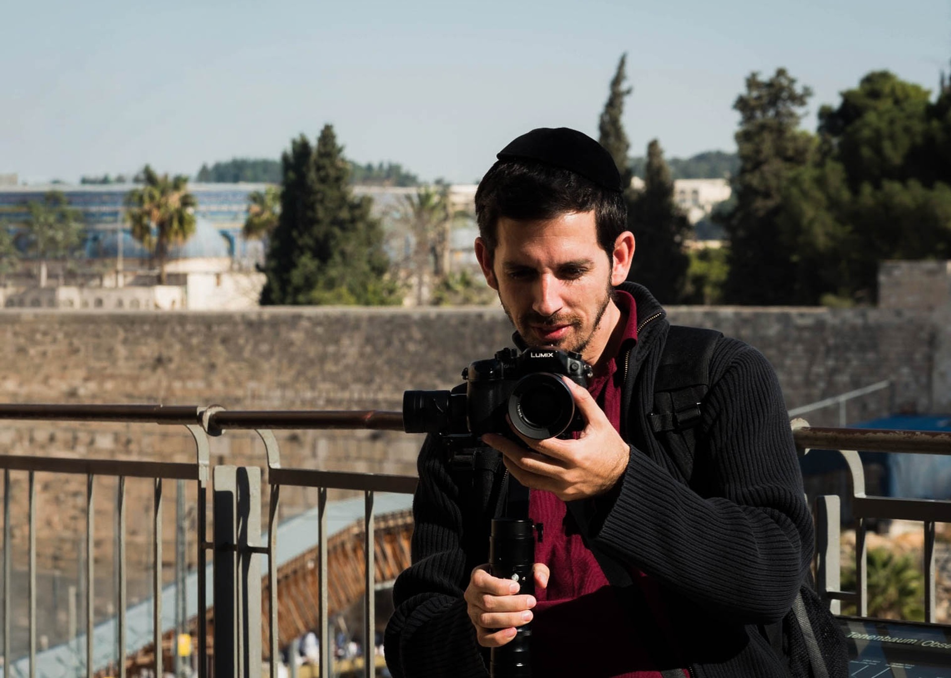 Menachem Schloss filming a wedding at the Kotel, Beit Shemesh, Israel